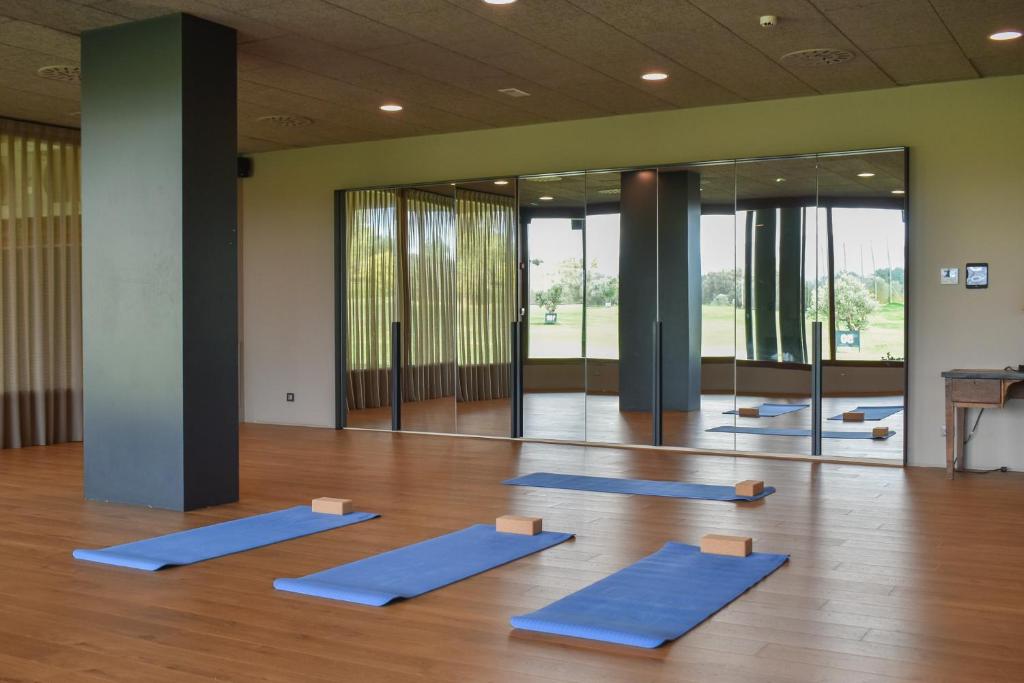 Posilňovňa alebo fitness centrum v ubytovaní Hotel Peralada Wine Spa & Golf