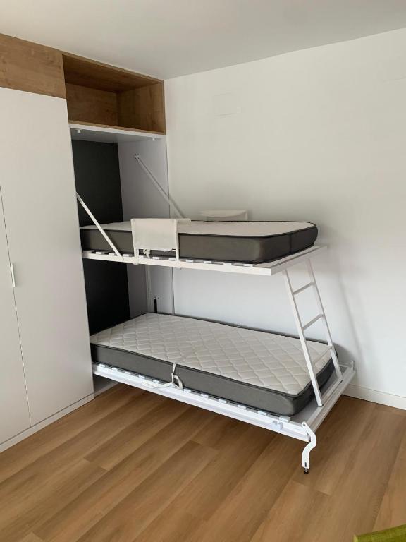 Łóżko lub łóżka w pokoju w obiekcie Apartamento Plaza Pradollano 2