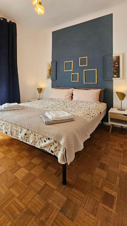 Postel nebo postele na pokoji v ubytování Camere Passetto