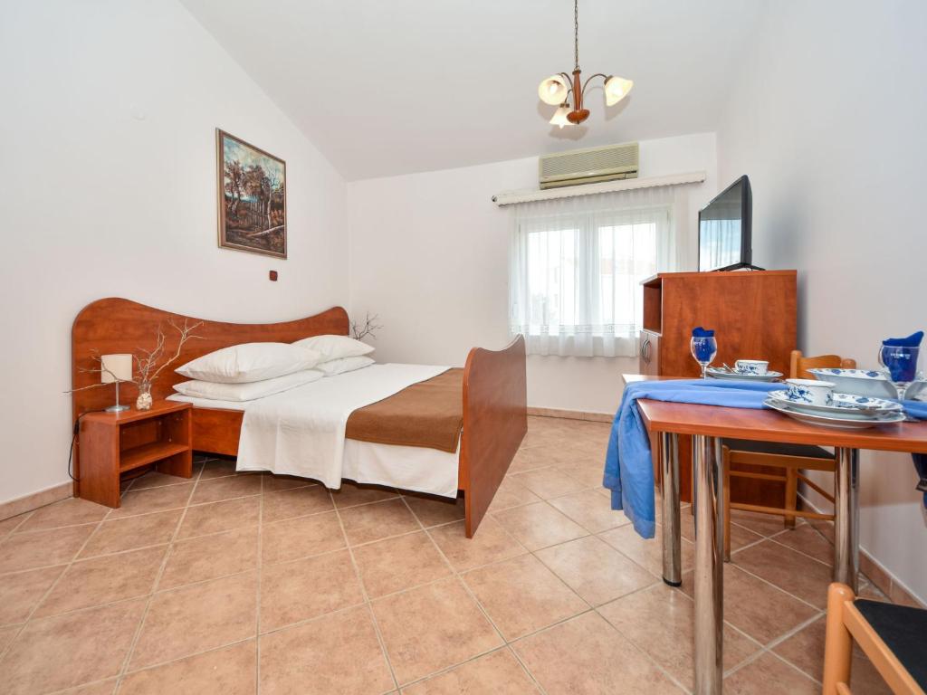 Postel nebo postele na pokoji v ubytování Apartment Delfin-11 by Interhome