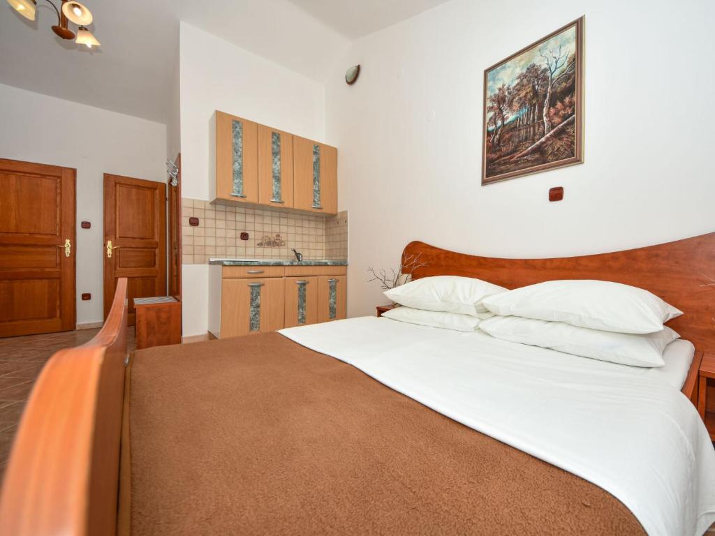 Postel nebo postele na pokoji v ubytování Apartment Delfin-11 by Interhome