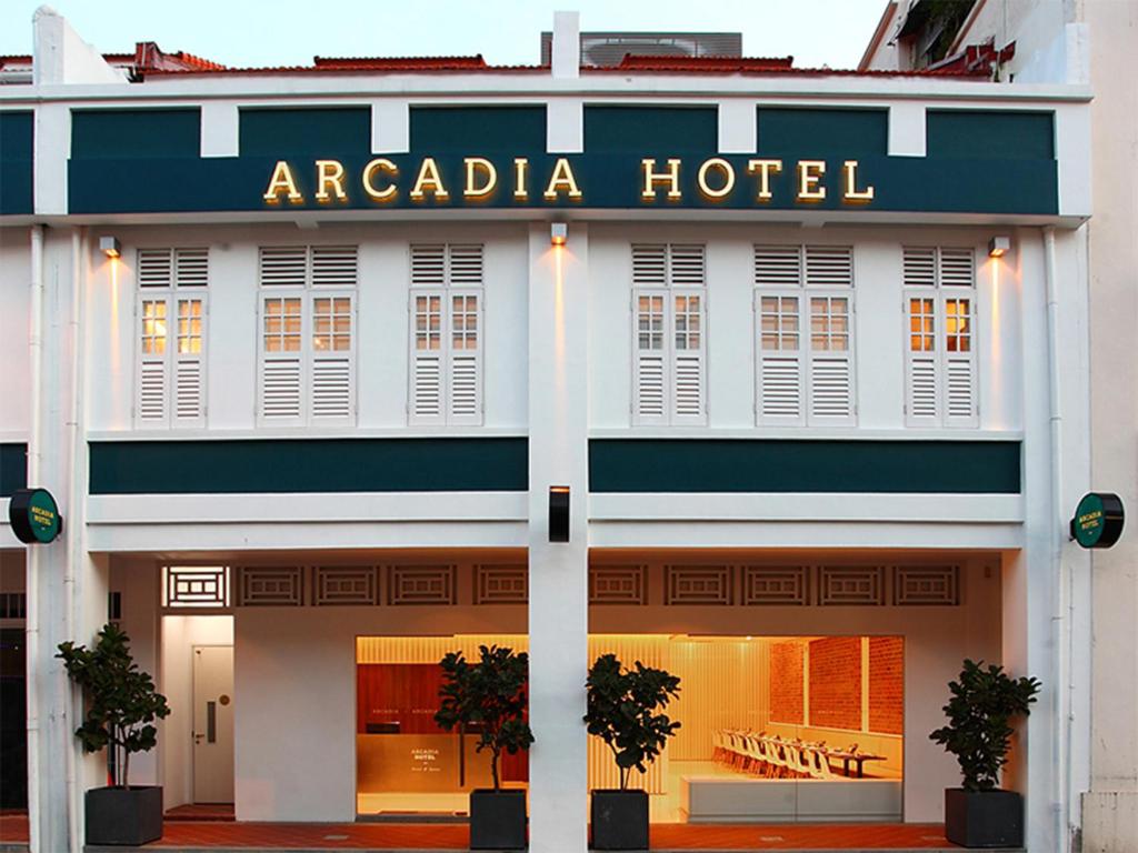 a hotel with a sign that reads aradiadi hotel at Arcadia Hotel in Singapore