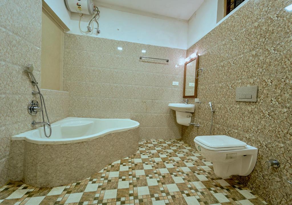 Koupelna v ubytování Ushasree Wayanad Heritage Premium Pool Resort by VOYE HOMES