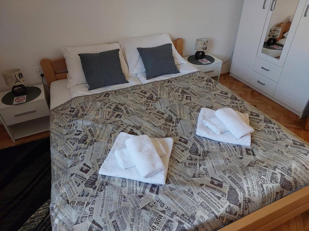Uma cama ou camas num quarto em Apartman Sweet Dreams