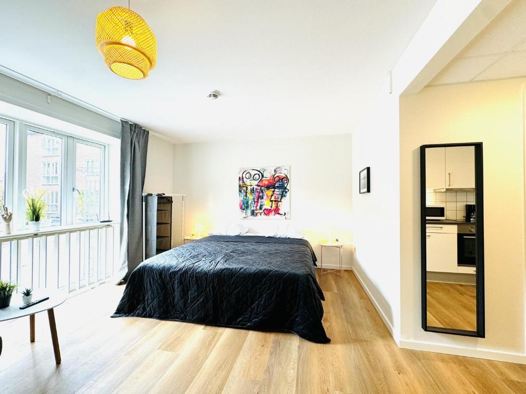 Postel nebo postele na pokoji v ubytování aday - Lollandsgade Studio Apartment Suite