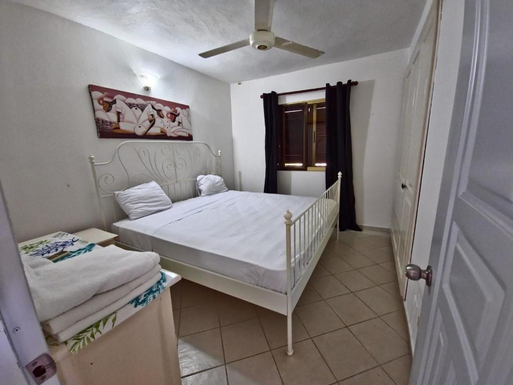 Giường trong phòng chung tại Apts dentro de Residencial Soficu Eden