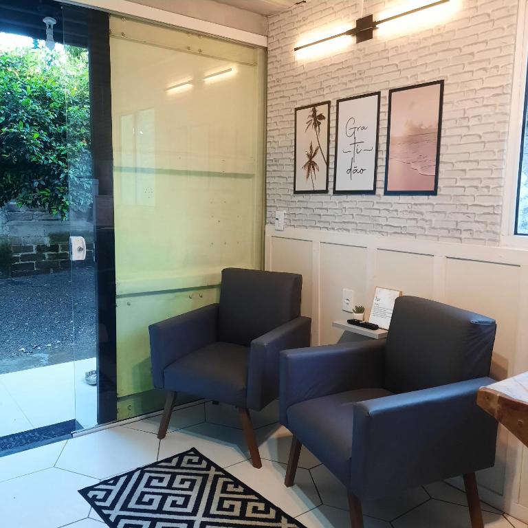 Posezení v ubytování Apartamento Container com pátio, vaga para carro e Split