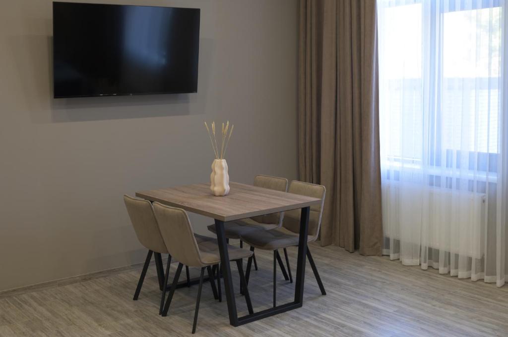 TV a/nebo společenská místnost v ubytování REST INN apart hotel