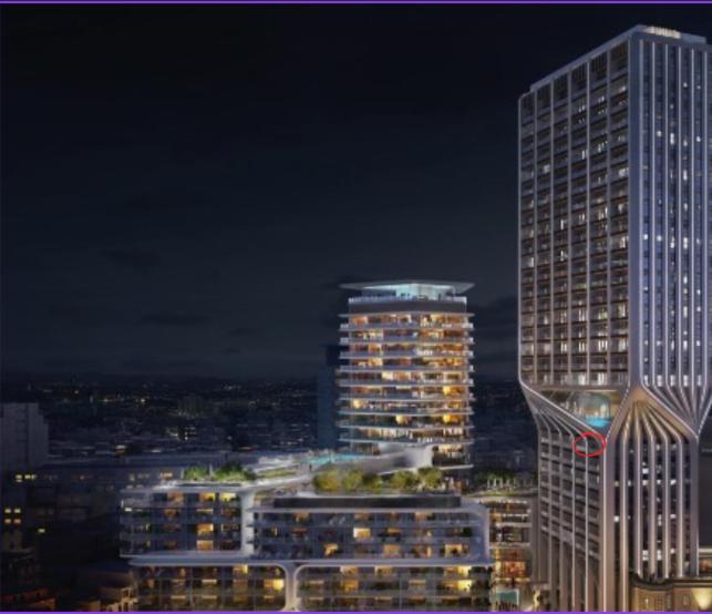 a tall building in a city at night at Chic & Cheeky Reside in Malta's Tallest Skyscraper in St Julian's