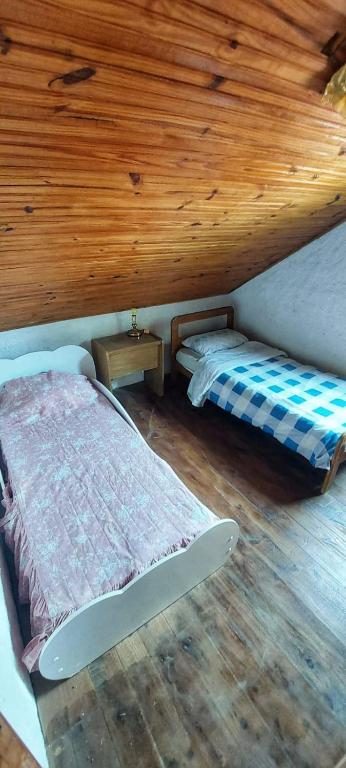 Postel nebo postele na pokoji v ubytování Cabañas Virazon Aguas Dulces
