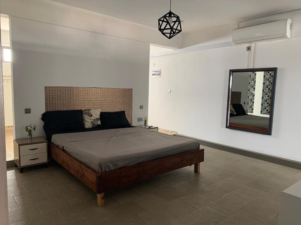 Postel nebo postele na pokoji v ubytování TheLight Villa