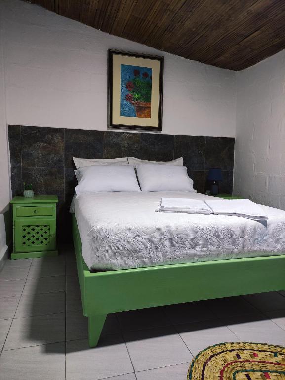 Postel nebo postele na pokoji v ubytování Finca San Alejandro