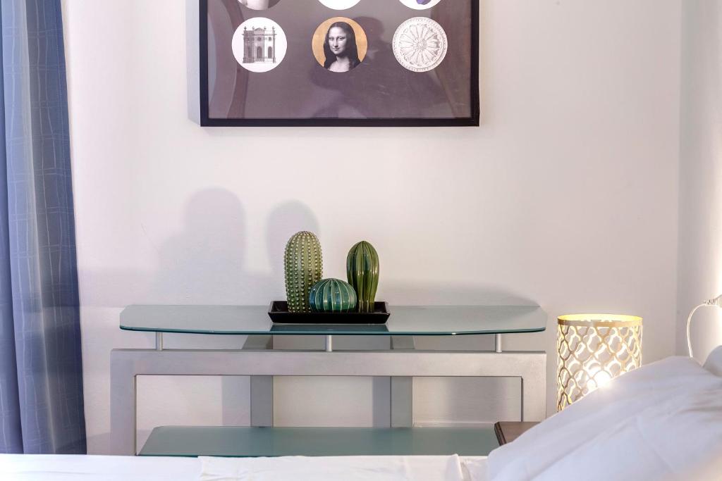 A bed or beds in a room at Pisana Apartment by Mamo Florence