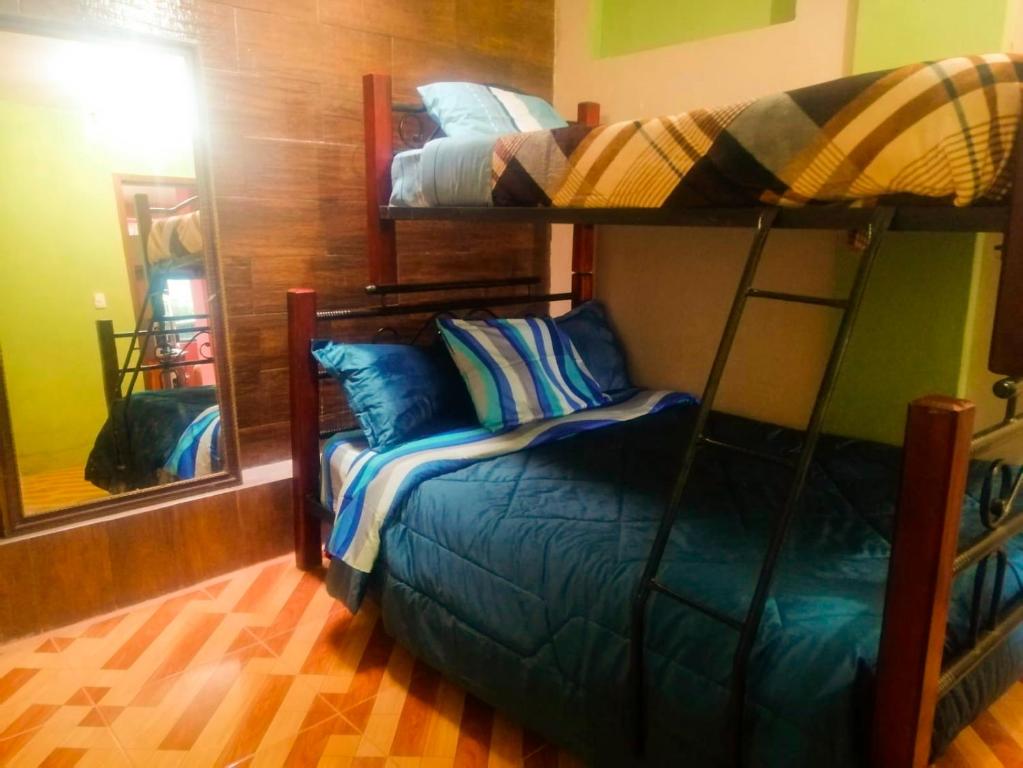 Postel nebo postele na pokoji v ubytování Hermosa casa rodeada de naturaleza