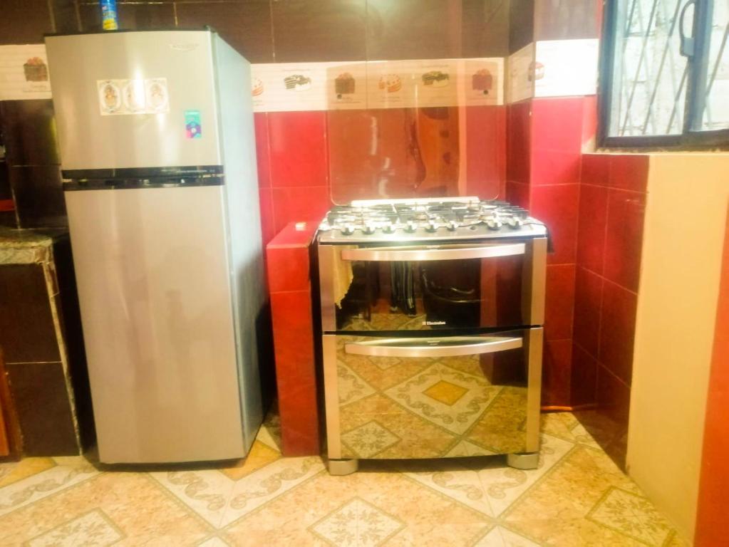 Kuchyň nebo kuchyňský kout v ubytování Hermosa casa rodeada de naturaleza