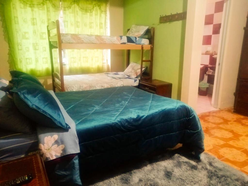 Postel nebo postele na pokoji v ubytování Hermosa casa rodeada de naturaleza
