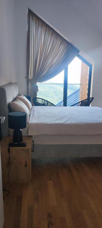 Vuode tai vuoteita majoituspaikassa Aspectus apartmani Divcibare
