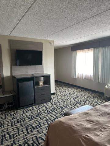 Postel nebo postele na pokoji v ubytování Quality Inn