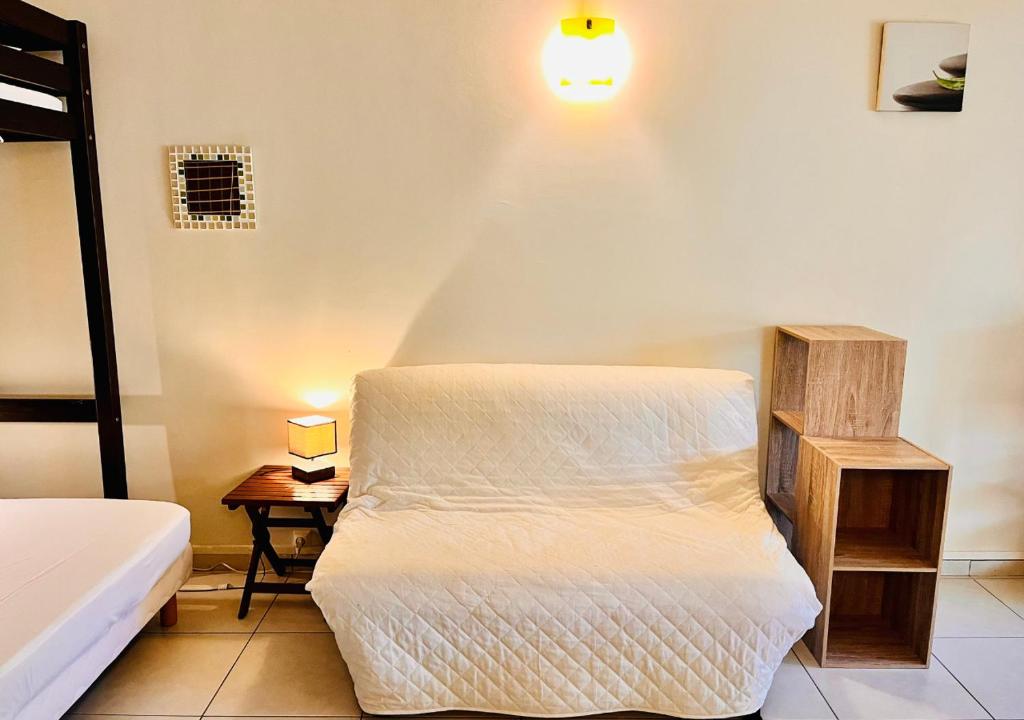 Postel nebo postele na pokoji v ubytování Studio Émeraude - Vue mer - 6 personnes