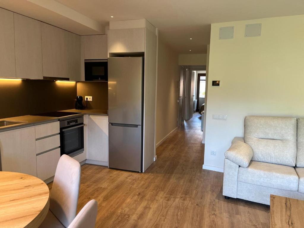 Kuchyň nebo kuchyňský kout v ubytování Apartament BOIX de Molló Parc