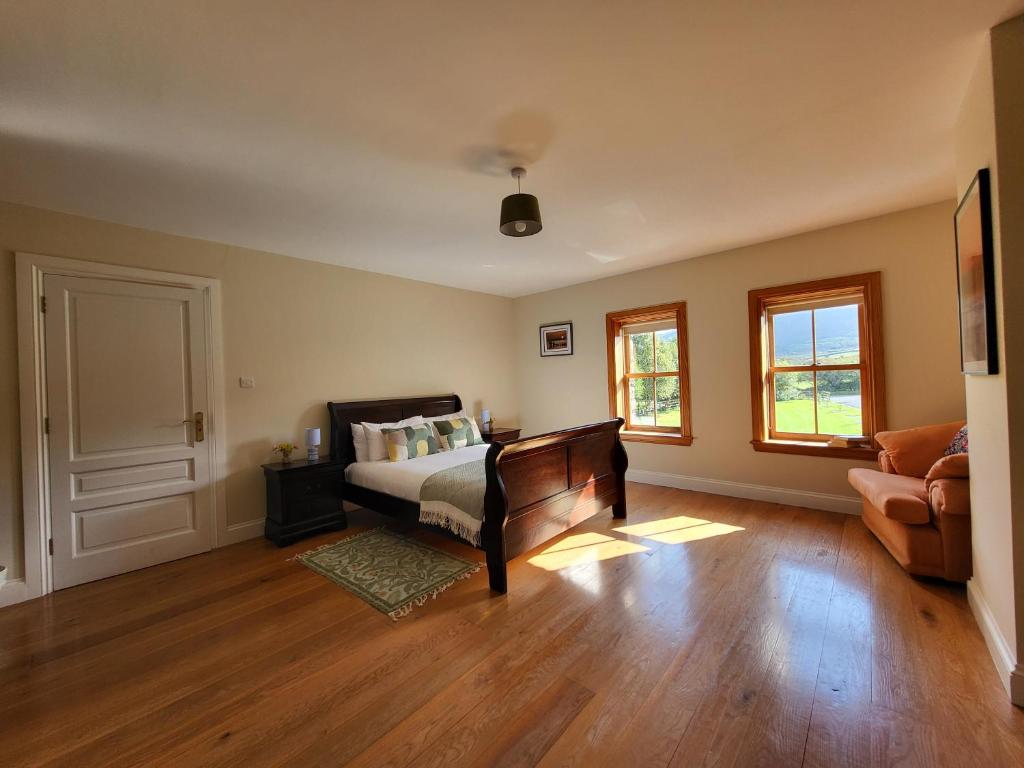 Postel nebo postele na pokoji v ubytování Reeks Country House