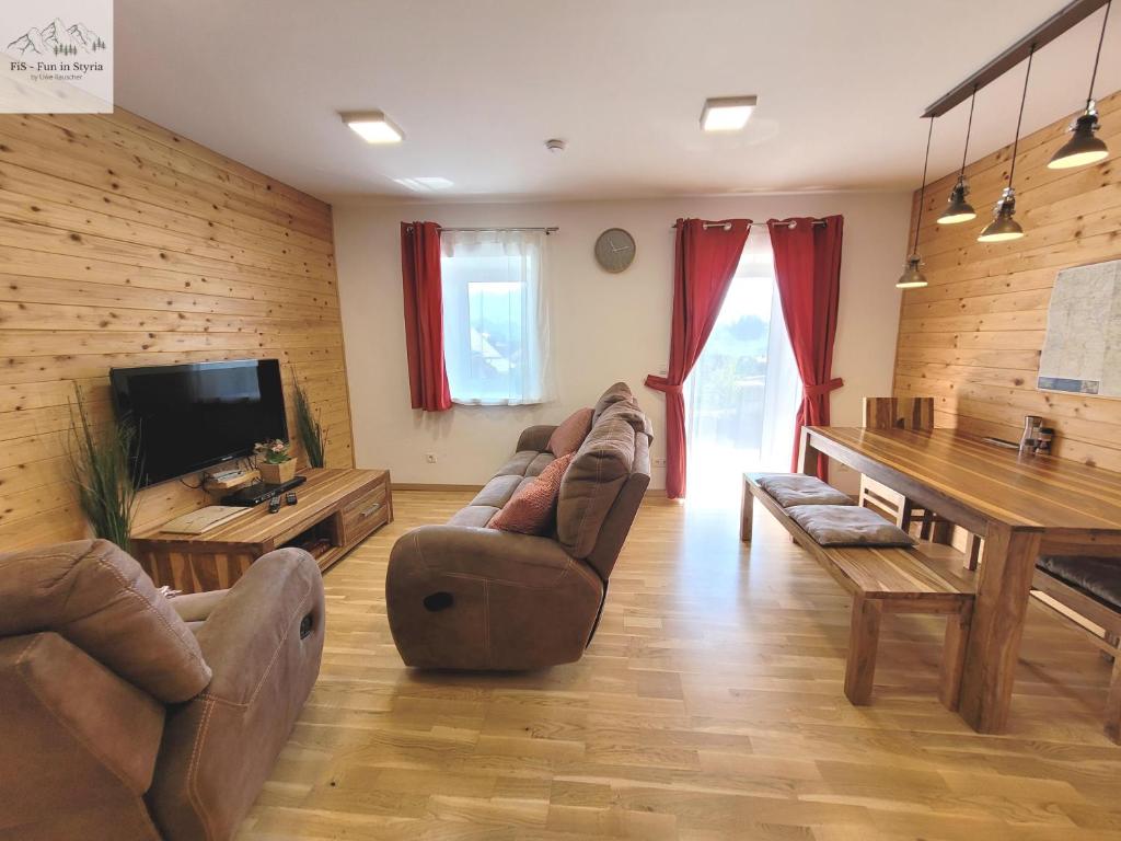 Televízia a/alebo spoločenská miestnosť v ubytovaní Alpine Tauplitz TOP 5