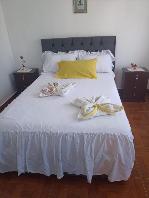 Postel nebo postele na pokoji v ubytování Hostal Dorys Mar