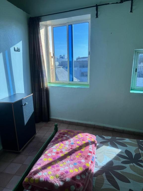 Postel nebo postele na pokoji v ubytování Hotel majestc