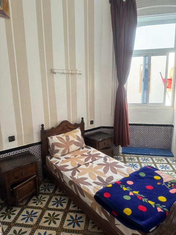 Postel nebo postele na pokoji v ubytování Hotel majestc