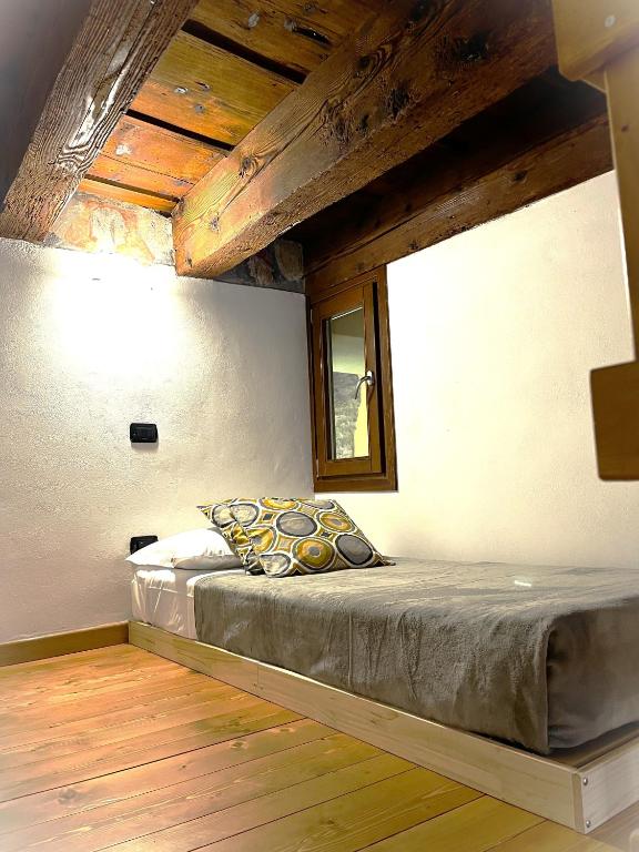 Posteľ alebo postele v izbe v ubytovaní Johnny Suites Bergamo Alta