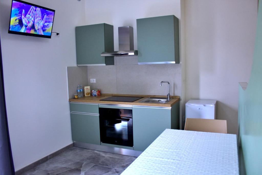 Kuchyň nebo kuchyňský kout v ubytování B&B IlTempio