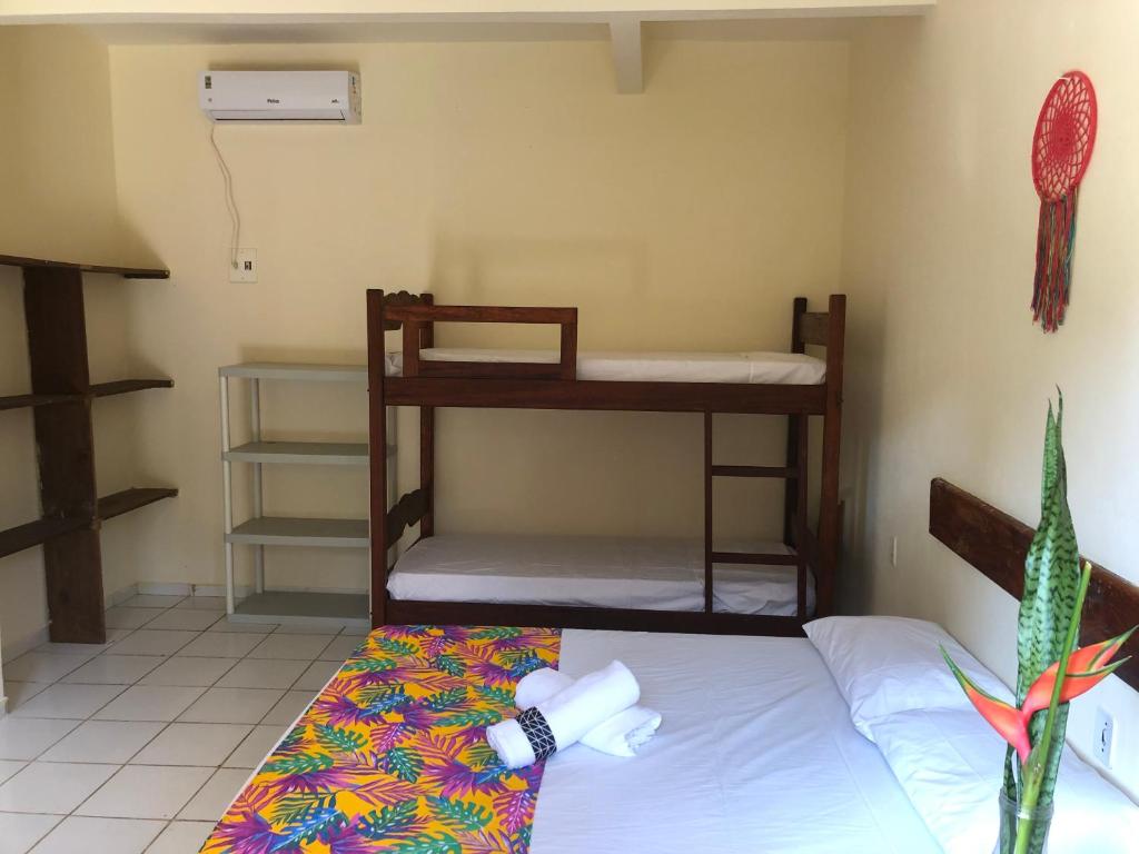 Postel nebo postele na pokoji v ubytování Alecrim Hostel e Pousada