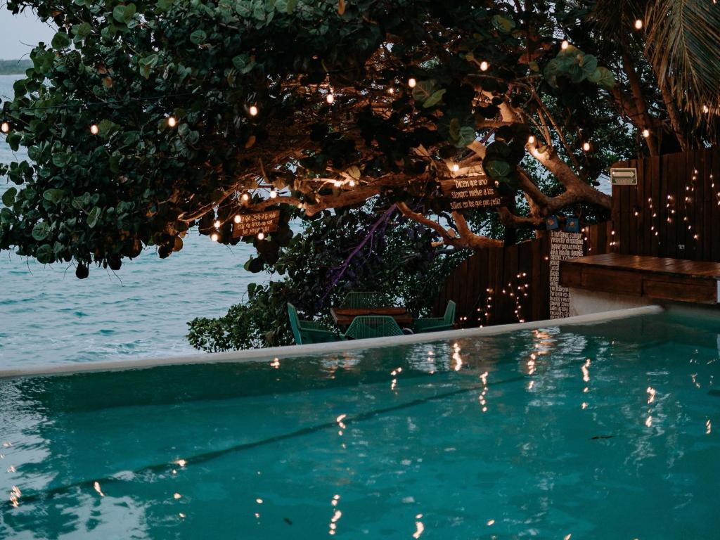 Bazén v ubytování Khaban Bacalar Hotel Boutique nebo v jeho okolí