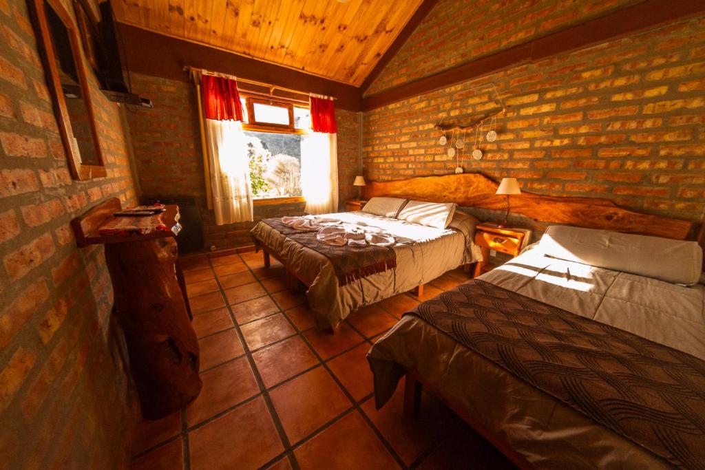 Postel nebo postele na pokoji v ubytování El Hostal del Rio