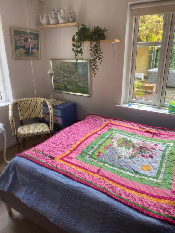 Postel nebo postele na pokoji v ubytování Katja B&B Roskilde Tutti Frutti Home
