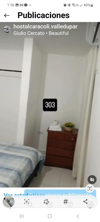 Letto o letti in una camera di HOSTAL CARACOLI - HUECO