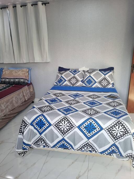 Postel nebo postele na pokoji v ubytování Stúdio andar superior, próximo ao hotel Rafain Palace