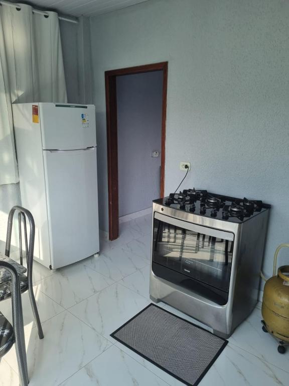 Kuchyň nebo kuchyňský kout v ubytování Stúdio andar superior, próximo ao hotel Rafain Palace