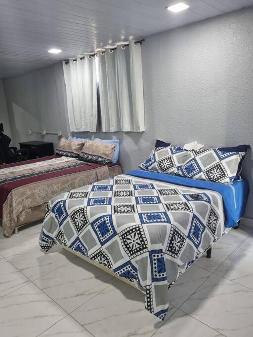Postel nebo postele na pokoji v ubytování Stúdio andar superior, próximo ao hotel Rafain Palace