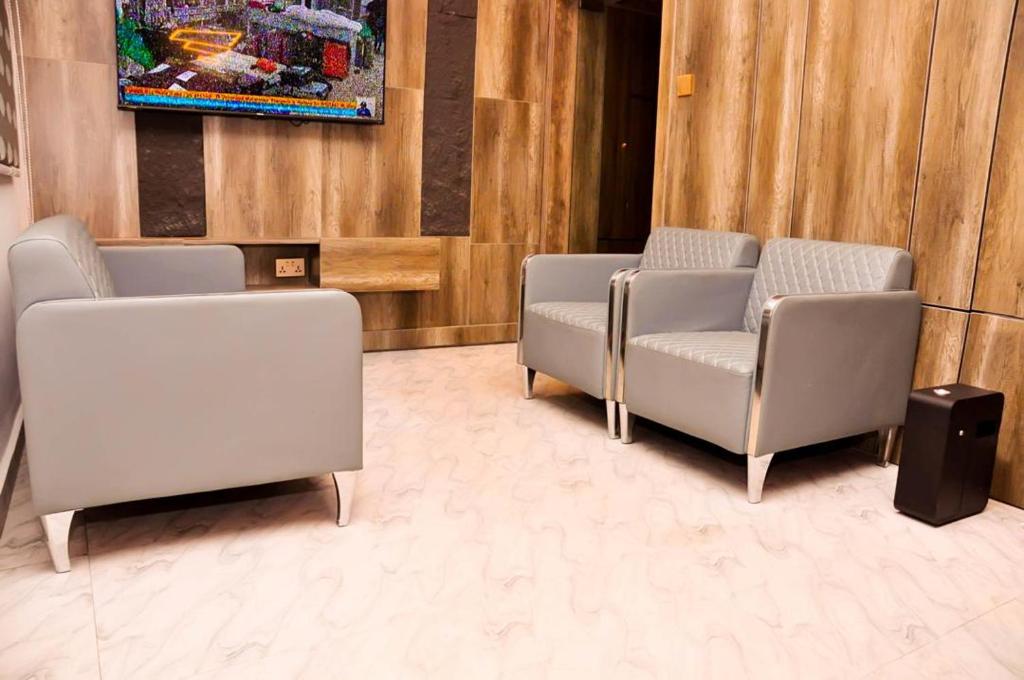 Posezení v ubytování Jukky Hotel Abuja