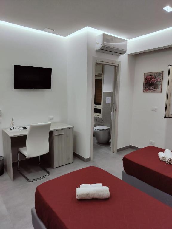 Postel nebo postele na pokoji v ubytování Bijou rooms