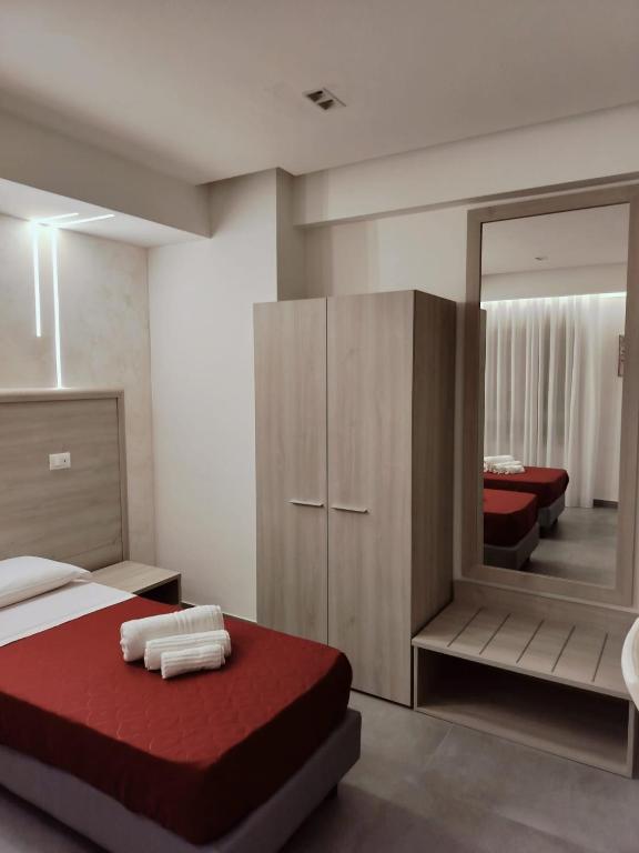Postel nebo postele na pokoji v ubytování Bijou rooms