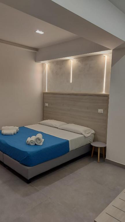 Postel nebo postele na pokoji v ubytování Bijou rooms