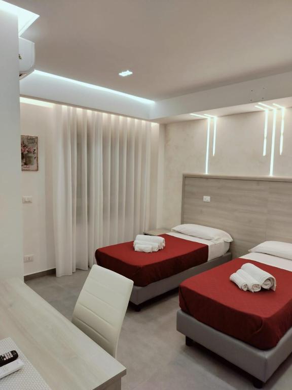 Postel nebo postele na pokoji v ubytování Bijou rooms