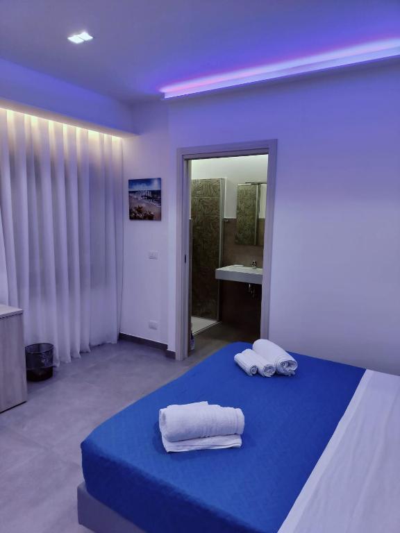 Postel nebo postele na pokoji v ubytování Bijou rooms