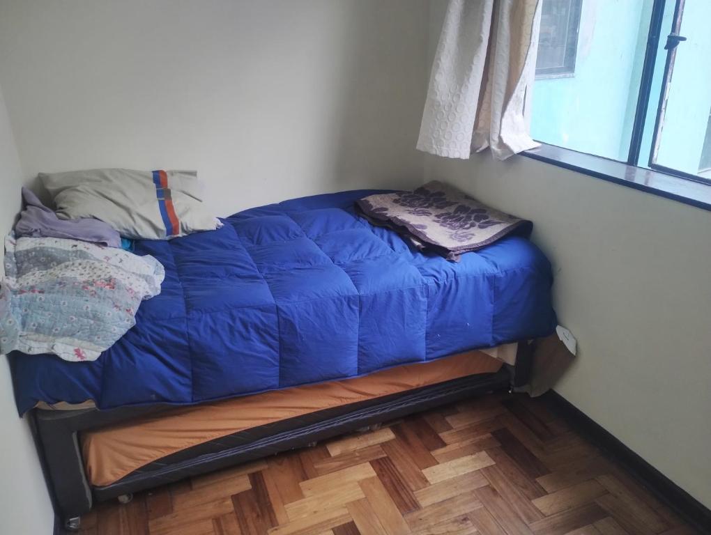 Postel nebo postele na pokoji v ubytování Habitación en departamento céntrico de Valparaíso