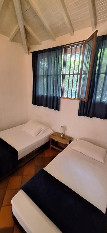 Postel nebo postele na pokoji v ubytování Yolo Hostel Medellin