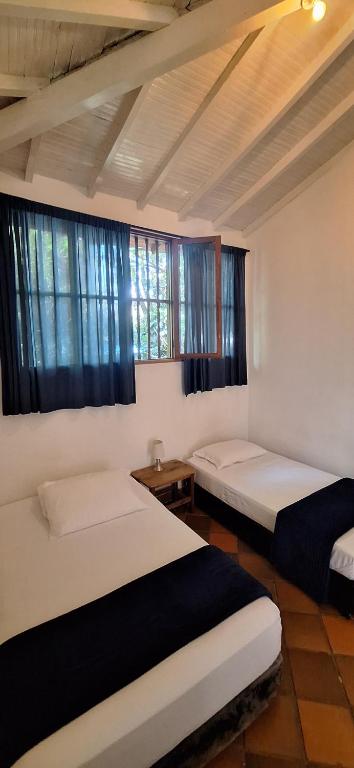 Postel nebo postele na pokoji v ubytování Yolo Hostel Medellin