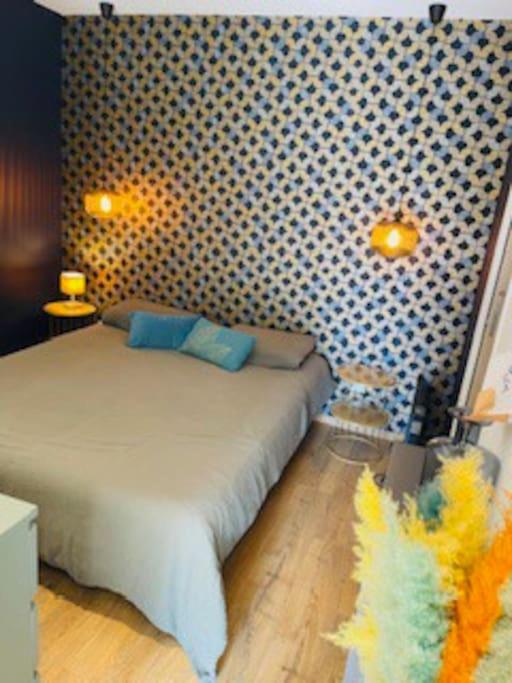 Postel nebo postele na pokoji v ubytování Studio NEUF