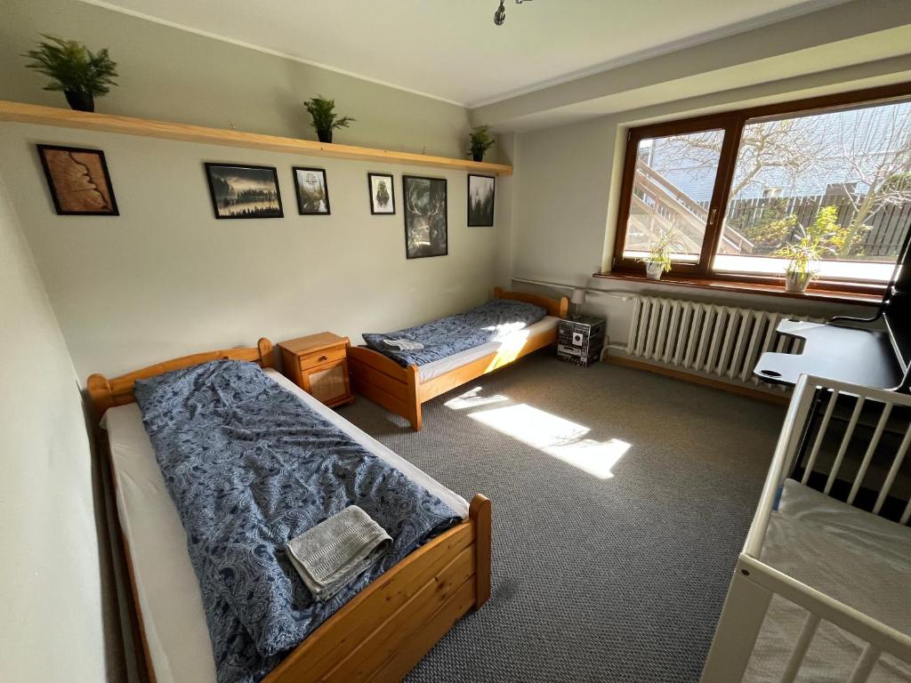 Postel nebo postele na pokoji v ubytování Apartament MATI